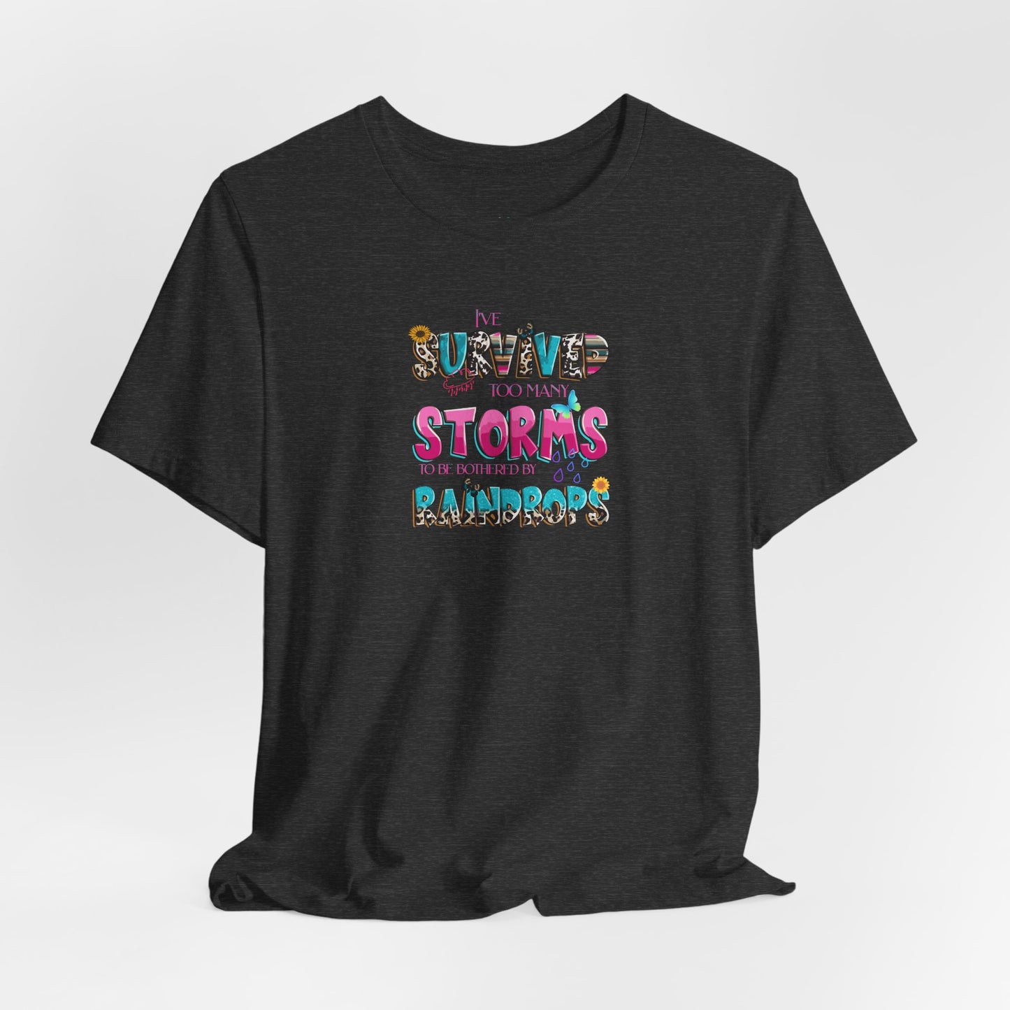 "I've Survived Too Many Storms to Be Bothered by Raindrops" Inspirational Graphic T‑Shirt