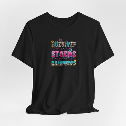 "I've Survived Too Many Storms to Be Bothered by Raindrops" Inspirational Graphic T‑Shirt