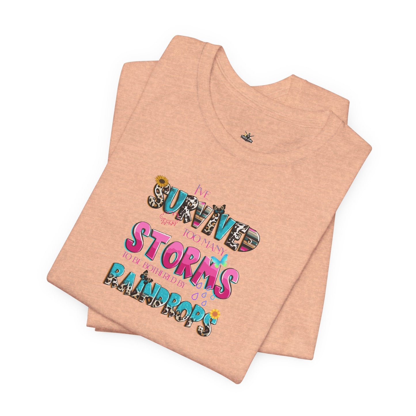 "I've Survived Too Many Storms to Be Bothered by Raindrops" Inspirational Graphic T‑Shirt