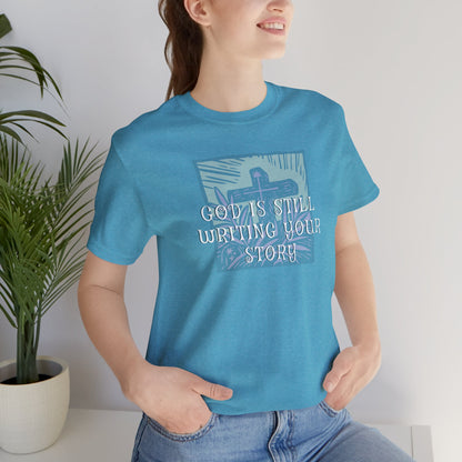 God Is Still Writing Your Story Tee — Inspirational Christian T‑Shirt
