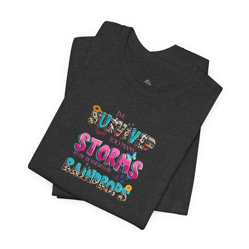 "I've Survived Too Many Storms to Be Bothered by Raindrops" Inspirational Graphic T‑Shirt