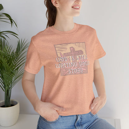God Is Still Writing Your Story Tee — Inspirational Christian T‑Shirt